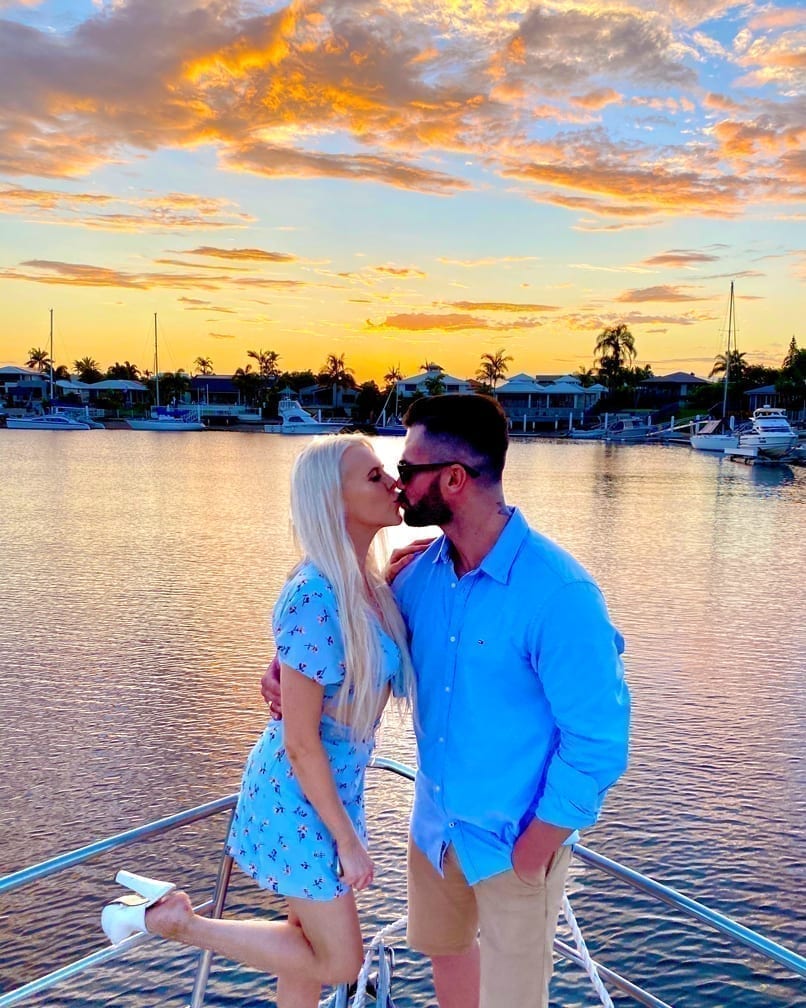 A kiss on a romantic sunset cruise aboard Crusader 1