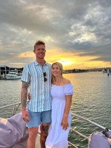 Sunshine Coast Afloat Sunset Cruise Couple On The Bow